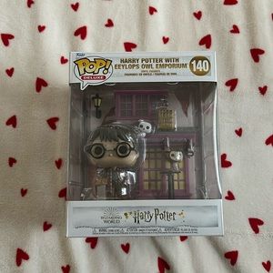 harry potter with eeylops owl emporium funko pop